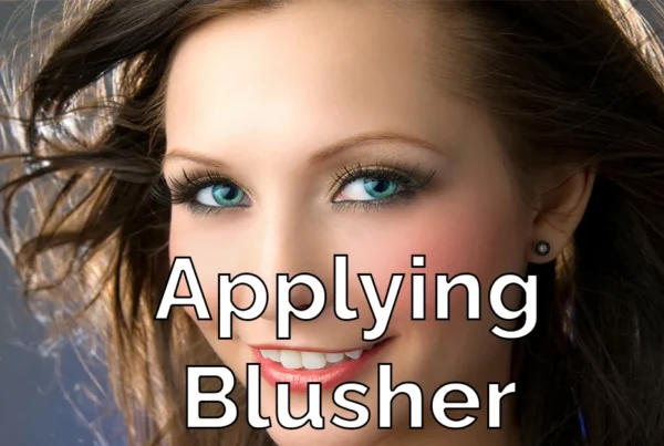 Photoshop tutorial thumbnail featuring the text "Apply Blusher" over a portrait of a woman with vibrant pink cheek color and smooth skin.
