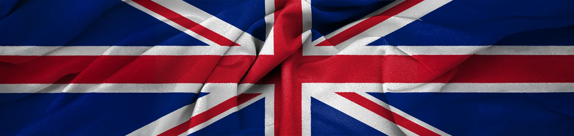 A wide panoramic banner showing a flat flag graphic being transformed into a realistic,