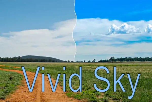 A wide panoramic landscape before and after comparison: a pale, overcast sky on the left and a dramatic, "Vivid Sky Effect" version on the right with deep blues, fiery oranges, and enhanced cloud contrast, with the text "Vivid Sky" over the top of it