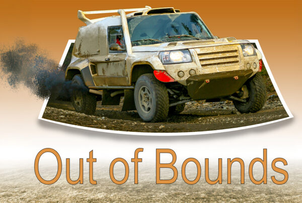 A wide panoramic banner showing a high-action sports photo where a rally car is jumping "out" of a polaroid-style frame, with the front wheel overlapping the white border and background with text "out of Bounds" at the bottom.